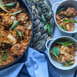 chicken meatballs and orzo in red pepper sauce plated