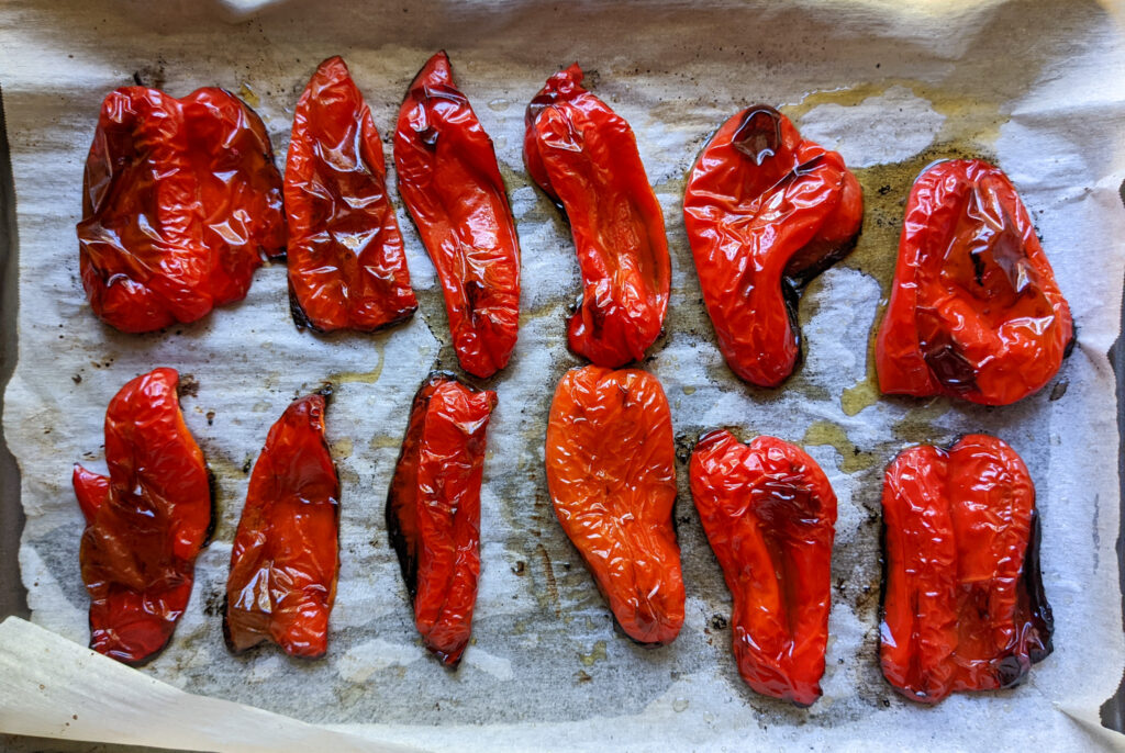 roasted red peppers on a pan