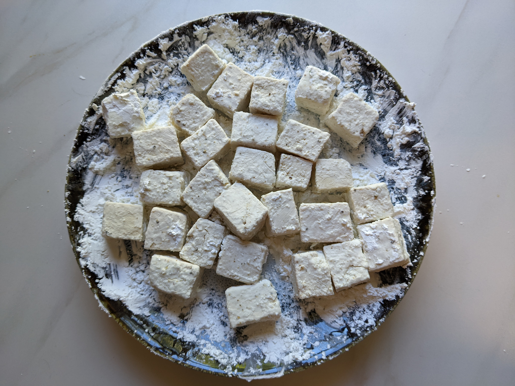 cornstarch covered tofu cubes