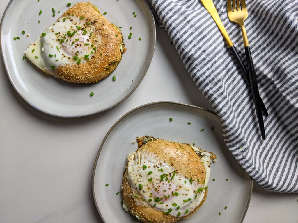 Eggs in a hole pesto bagel