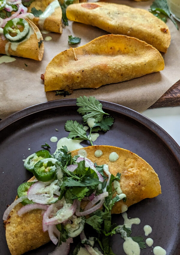 Crispy Chipotle Chicken Tacos with Avocado Cilantro Crema