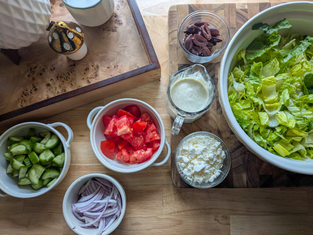 Greek salad with creamy Caesar dressing