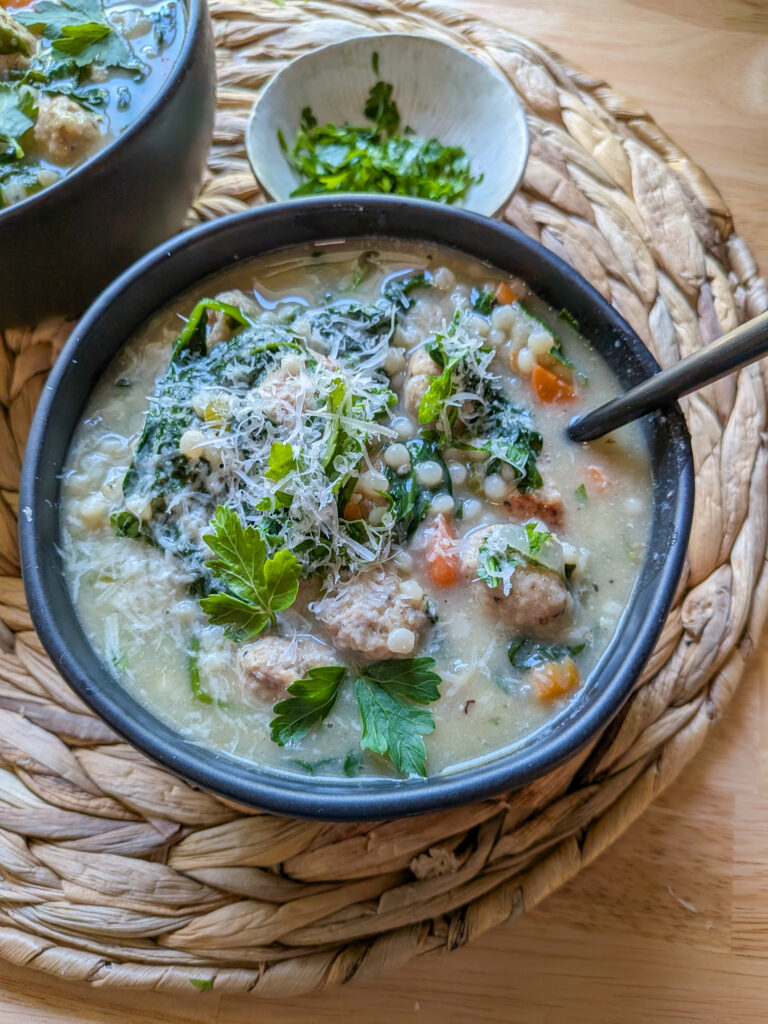 Homemade Italian wedding soup with pork meatballs