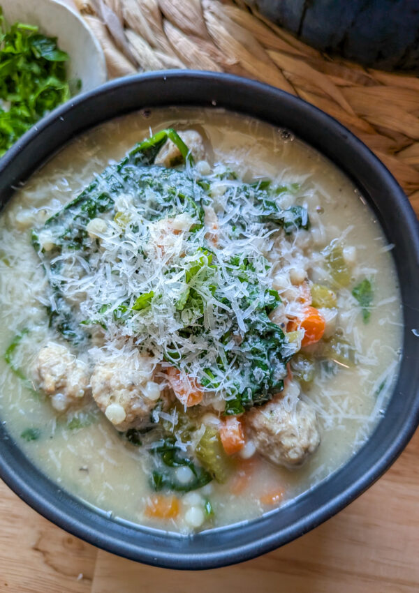 Homemade Italian wedding soup with pork meatballs